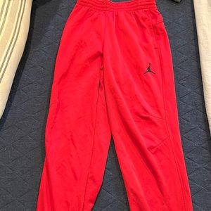 Red Jordan dri fit joggers, size small. Excellent condition never worn